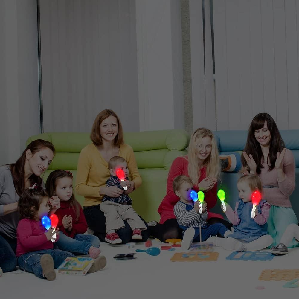 imageArtCreativity LightUp Color Changing Maracas Pack of 3 Flashing LED Music Hand Shakers Fun Noise Makers and Toy Musical Instruments Birthday Party Favors Goodie Bag Fillers for Kids