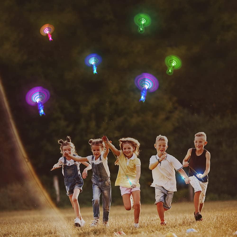 imageArtCreativity LightUp Slingshot Dragonfly for Kids Set of 12 LED Sling Shots for Nighttime Fun Outdoor Flying Toys for Boys ampamp Girls Glow LightUp Party Favors and Goodie Bag Fillers for Children