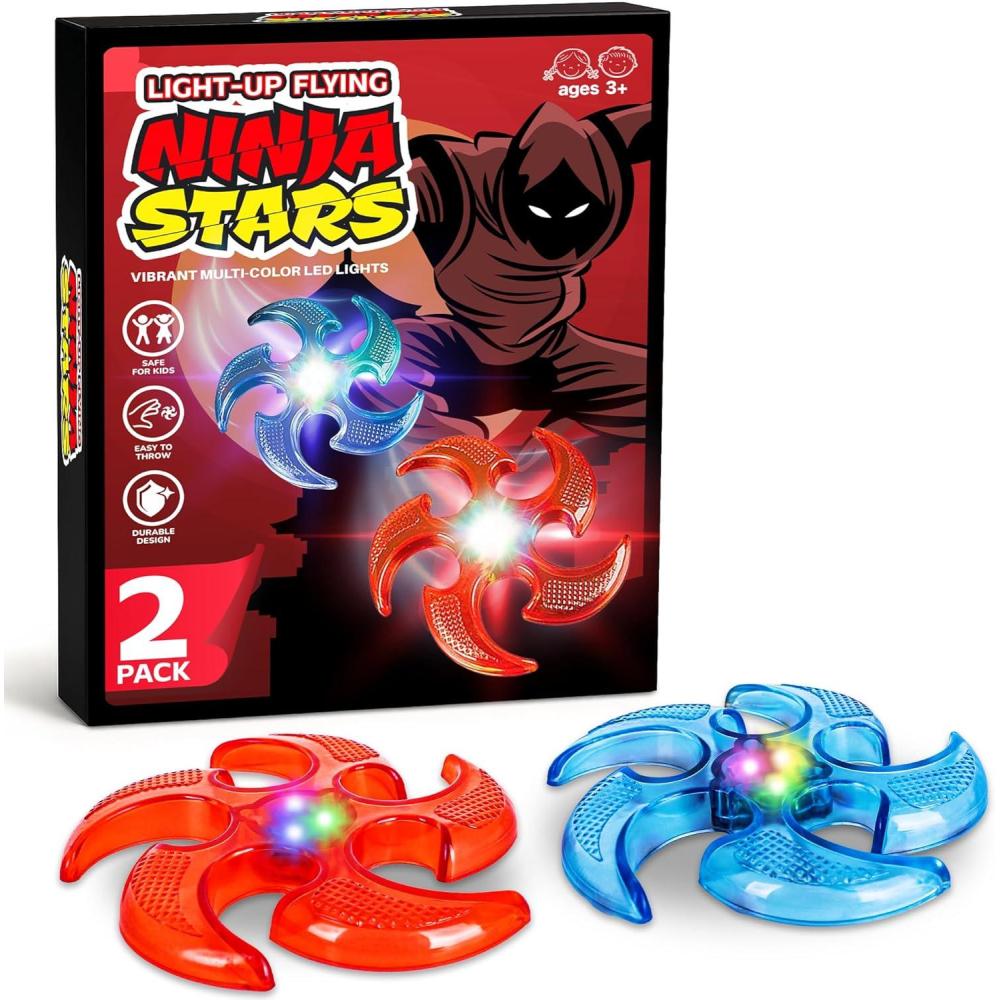 imageArtCreativity Light Up Flyers Set Pack of 2 Flying Ninja Stars for Kids Light Up Flying Toys with Batteries Fun Summer Toy and Gift for Kids Orange and Purple StarsRed Blue