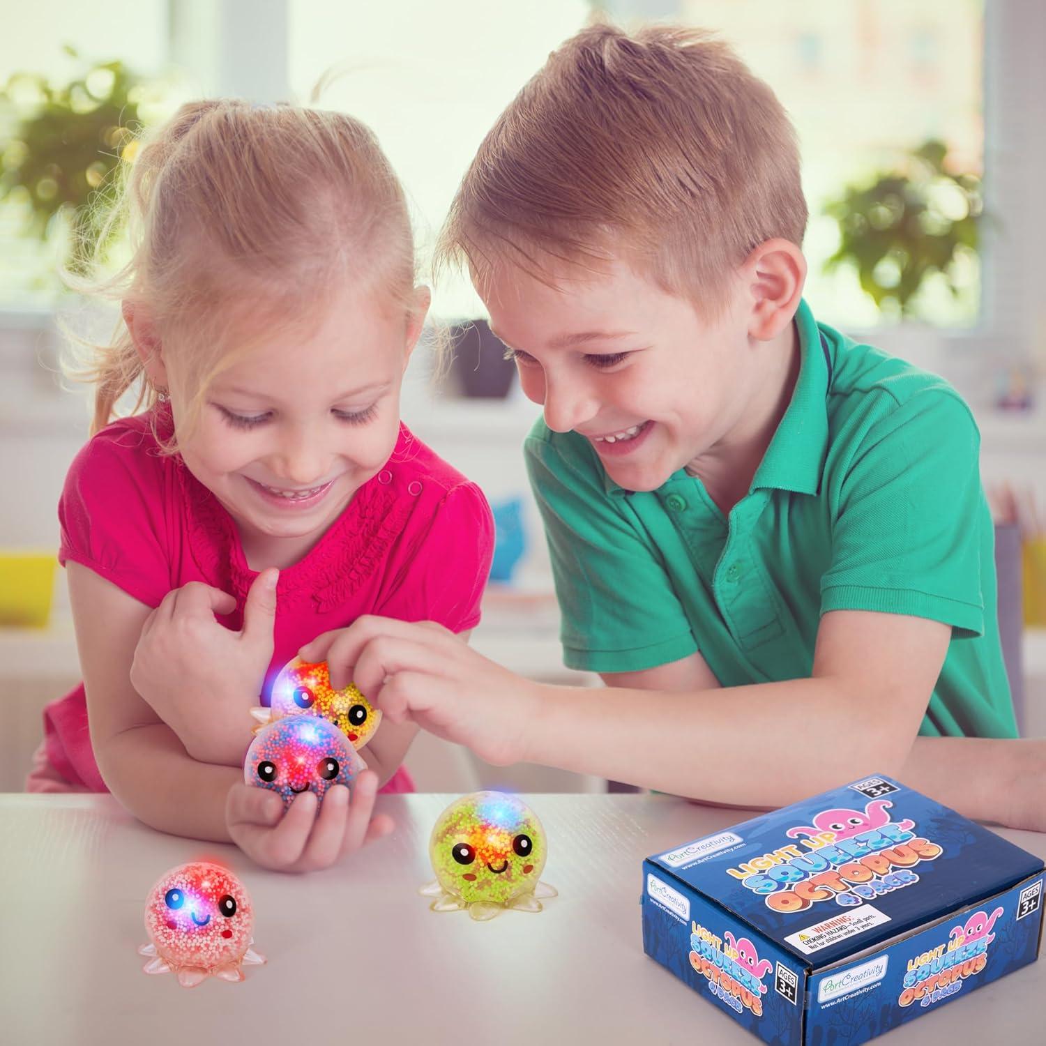 image:imageArtCreativity Jumbo Light Up Squishy Octopus Toys Set of 4 Fidget Sensory Toys for Kids amp Adults Glow in The Dark Toys for Autism ADHD Anxiety Party Favors amp Classroom Rewards